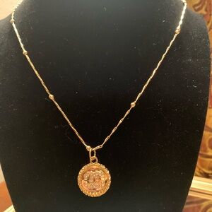 Gold-Tone Round Pendant Necklace with Crystal Motif